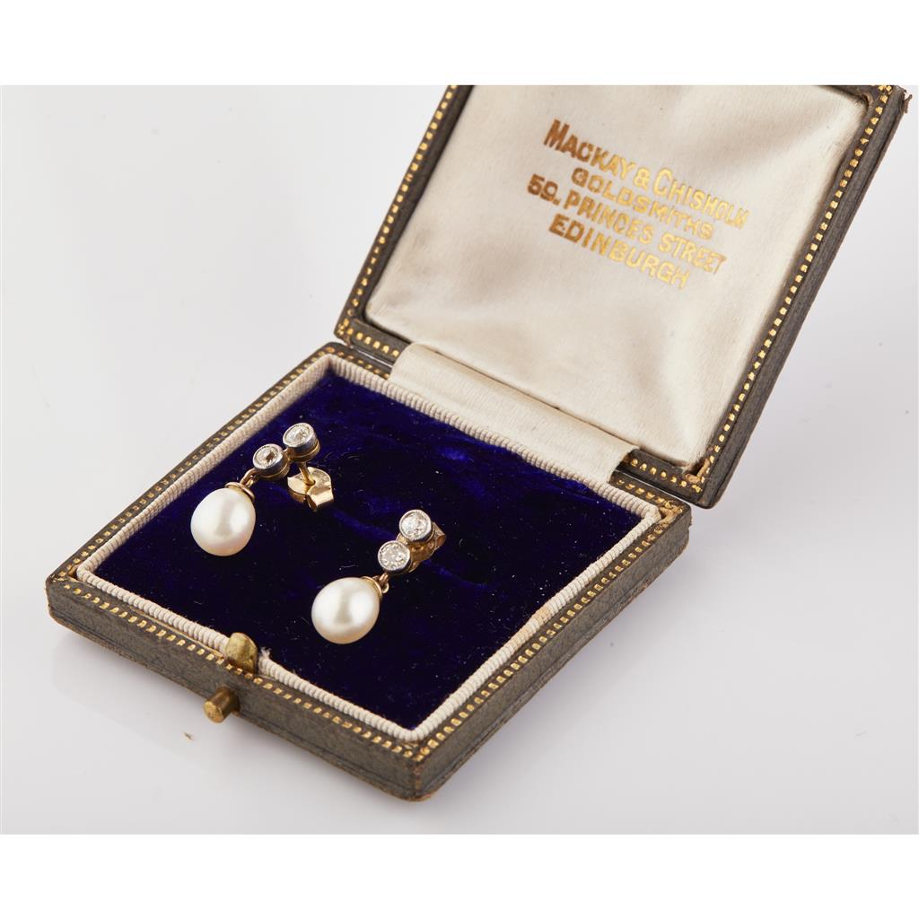 Appraisal: A pair of pearl and diamond set drop earrings each