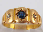 Appraisal: A yellow metal tests carat gold sapphire and diamond ring