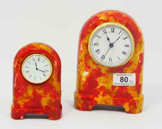 Appraisal: Royal Doulton Flambe Prototype Mantle Clocks decorated with a Red