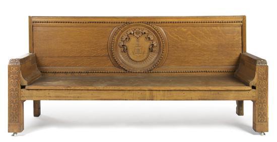 Appraisal: An American Carved Oak Hall Bench the back centered with