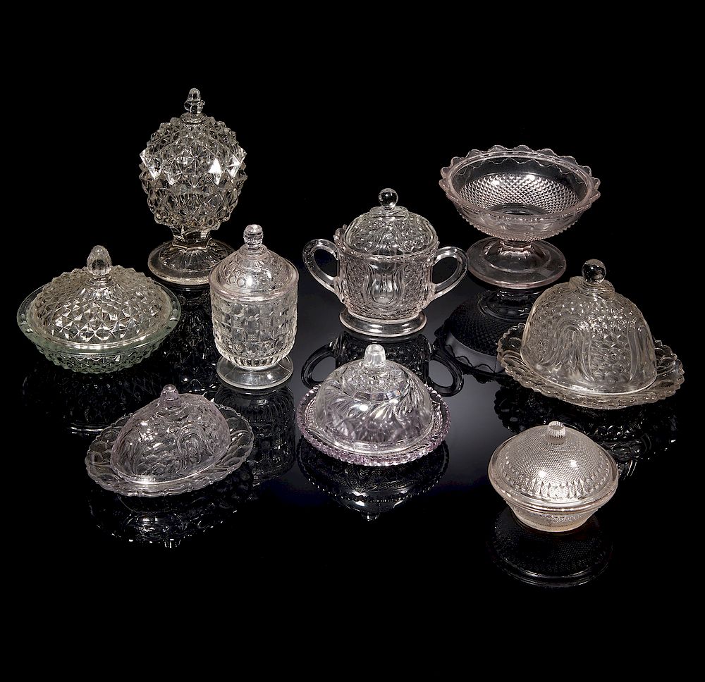 Appraisal: Nine Pressed Glass Covered Dishes Eight assorted pressed glass covered