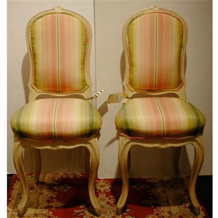 Appraisal: Pair of Rococo Style Painted Wood Chaises Estimate -