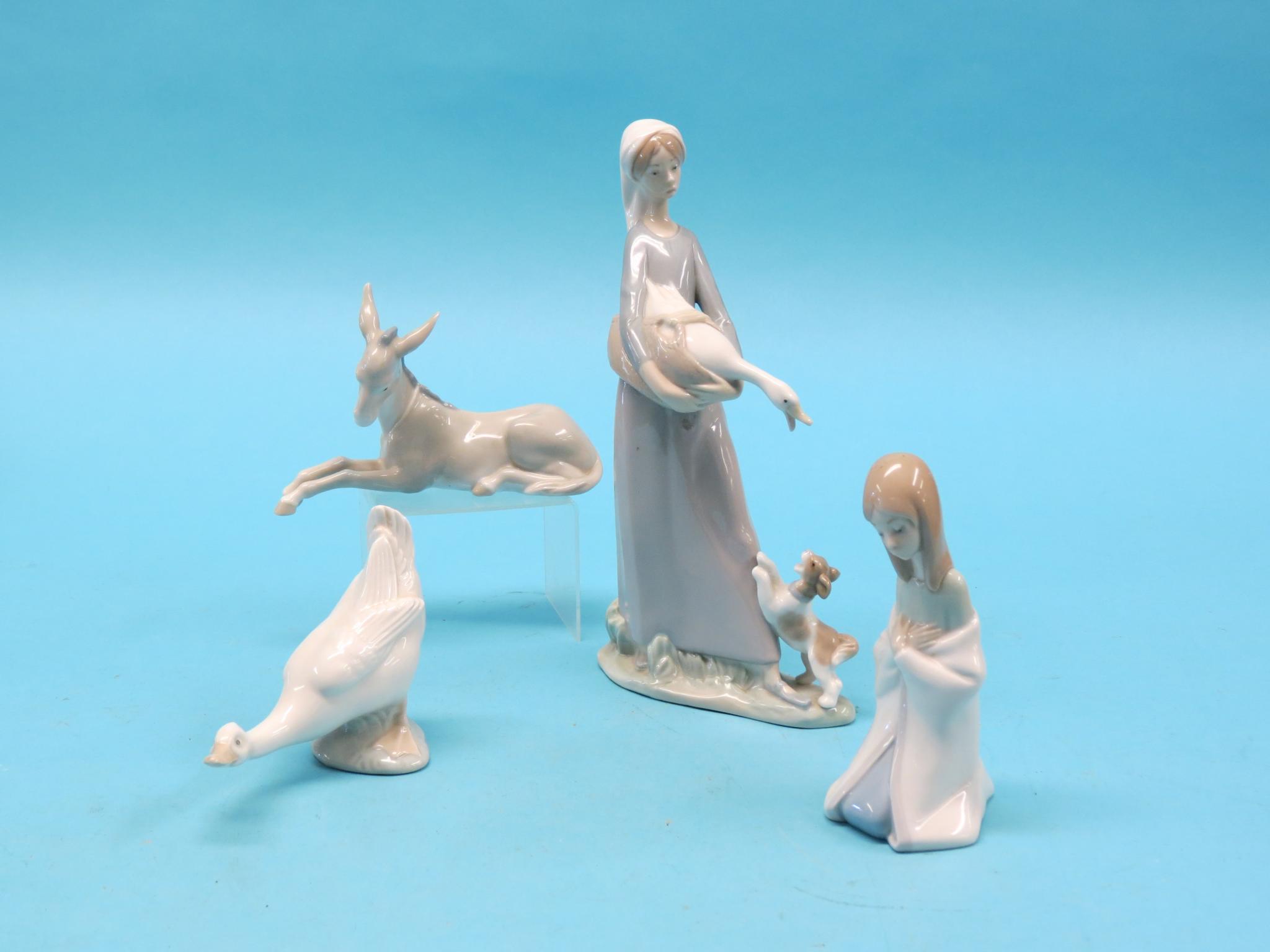 Appraisal: A Lladro model of a girl holding duck two other