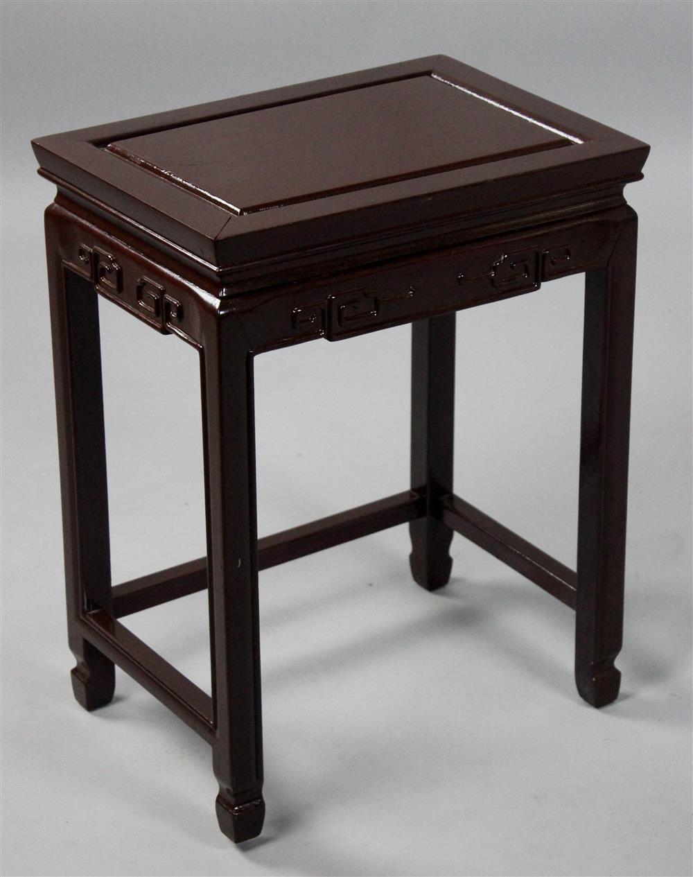 Appraisal: CHINESE SMALL HARDWOOD TABLE of rectangular shape with geometrically carved