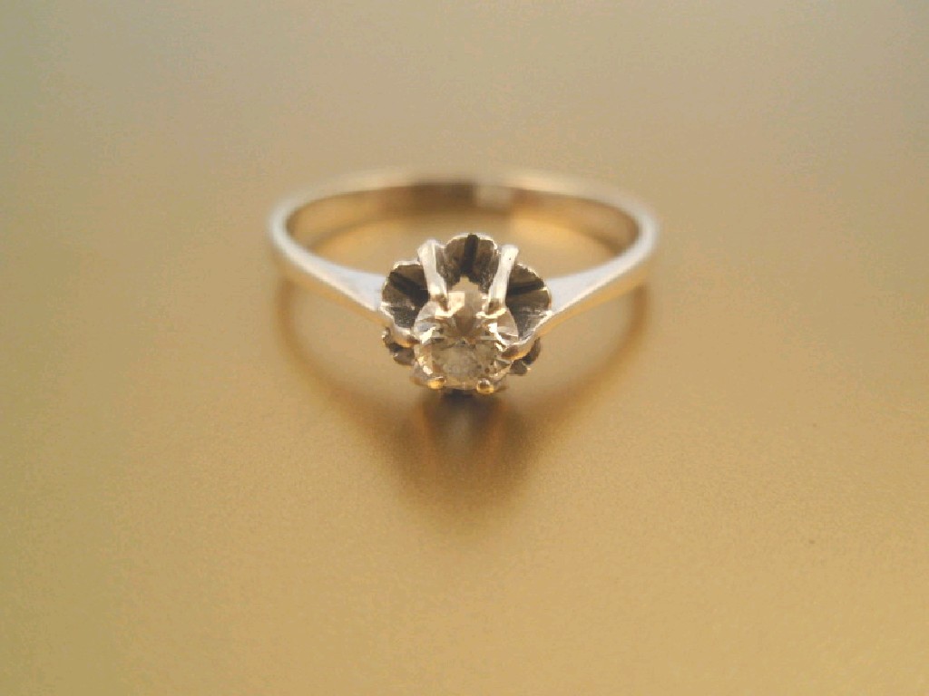 Appraisal: A solitaire diamond ring a modern round brilliant cut stone