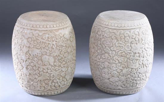 Appraisal: PAIR CHINESE WHITE STONE BARREL-FORM STOOLS Dragon decoration - in