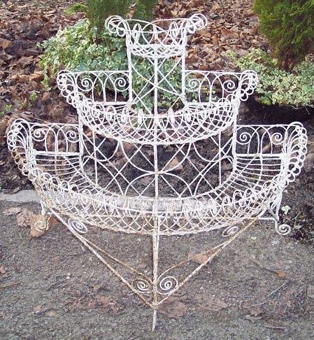 Appraisal: A wire work jardini re stand of three tiers with