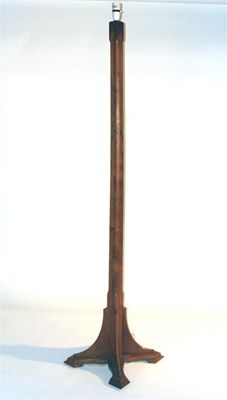 Appraisal: A Cotswolds School yew floor lamp square section with cruciform