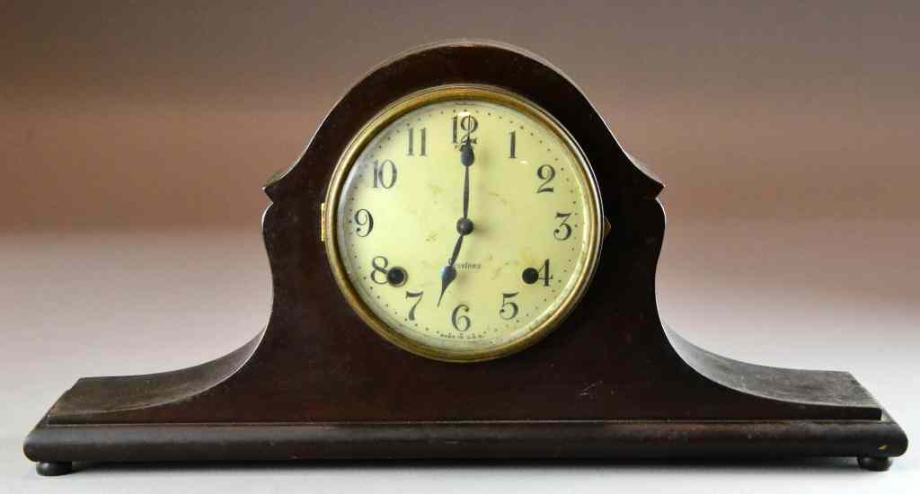 Appraisal: Sessions Mantle ClockMahogony mantle clock with brass concave glass door