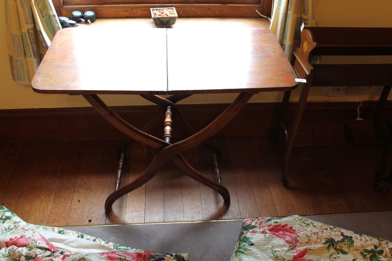 Appraisal: A thC beech and mahogany coaching table with rectangular folding