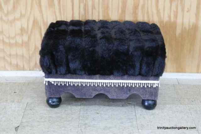 Appraisal: Black Faux Fur Covered Cushioned OttomanA very nice decorator faux