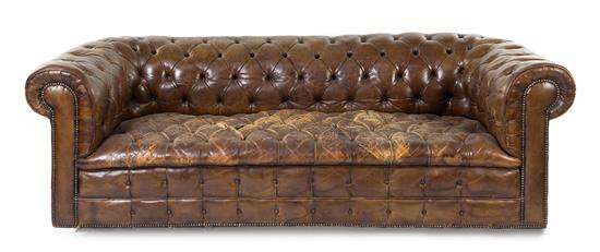 Appraisal: Sale Lot A Leather Upholstered Chesterfield Sofa of typical form