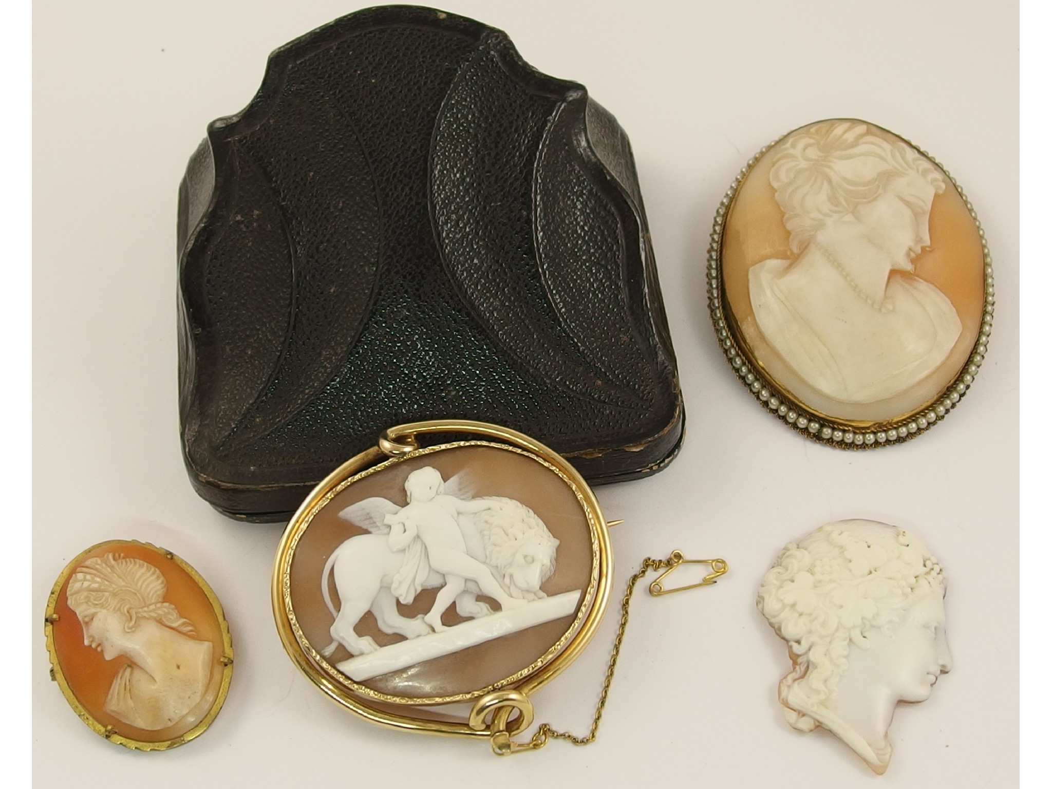 Appraisal: A very good large cameo depicting a lion and cupid