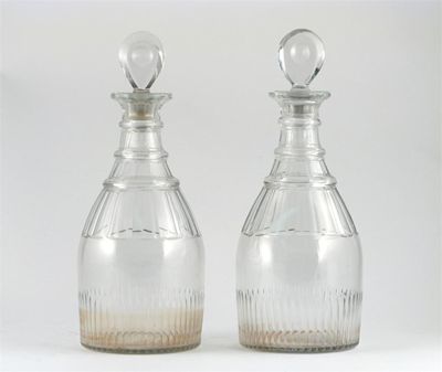 Appraisal: A pair of Prussian decanters with bullseye stoppers the faceted