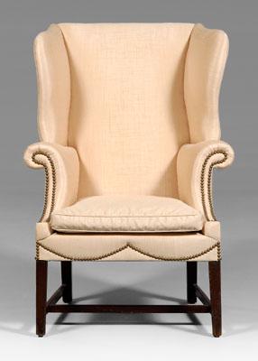 Appraisal: George III upholstered easy chair shaped wings and rolled arms