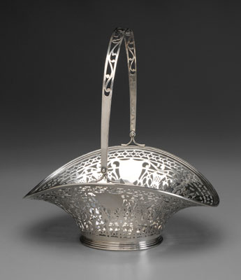 Appraisal: Sterling Basket th century oval form with openwork sides bail