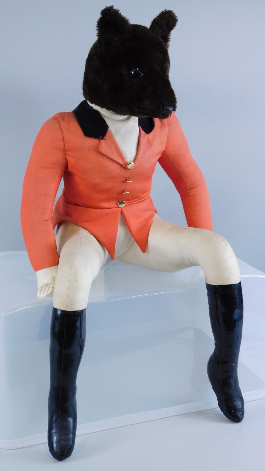 Appraisal: A large toy fox wearing hunting regalia to include boots