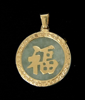 Appraisal: A Jade Pendant with k Gold Decorations k yellow gold