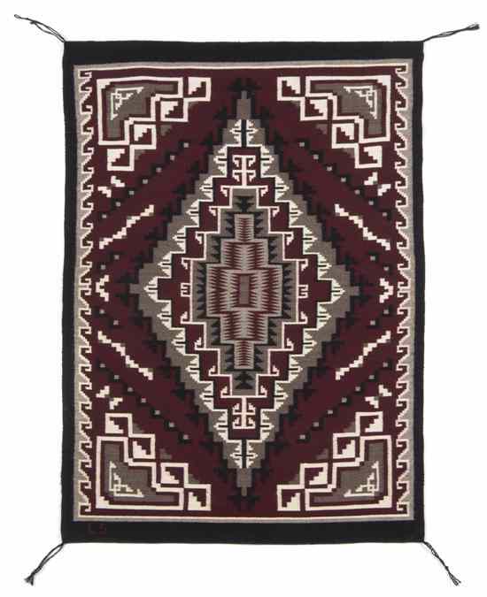 Appraisal: A Navajo Weaving Ganado with a geometric centerfield weaver Lucile