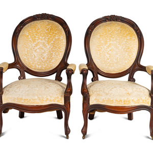 Appraisal: A Pair of Rococo Revival Carved Walnut Fauteuils Late th