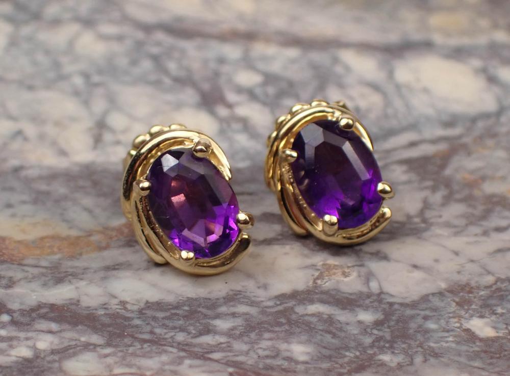 Appraisal: PAIR OF AMETHYST AND FOURTEEN KARAT GOLD EAR STUDS each