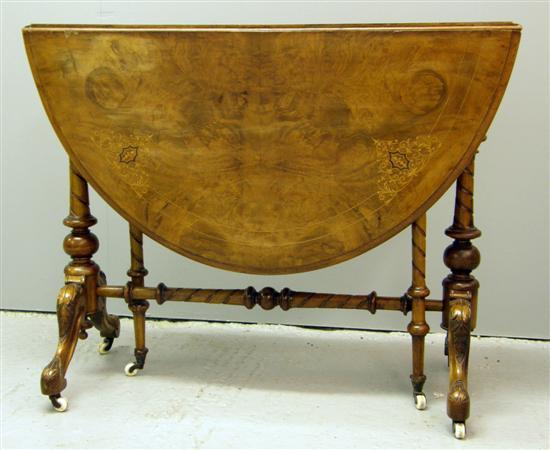 Appraisal: th century walnut parquetry inlaid sutherland table on twin end