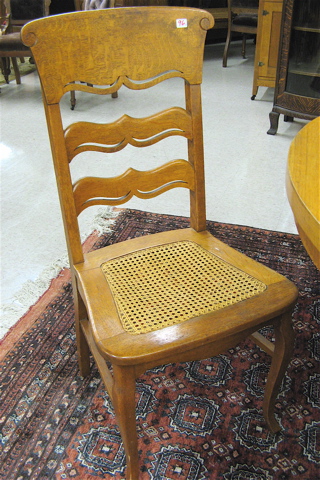 Appraisal: A SET OF SEVEN OAK DINING CHAIRS American c with