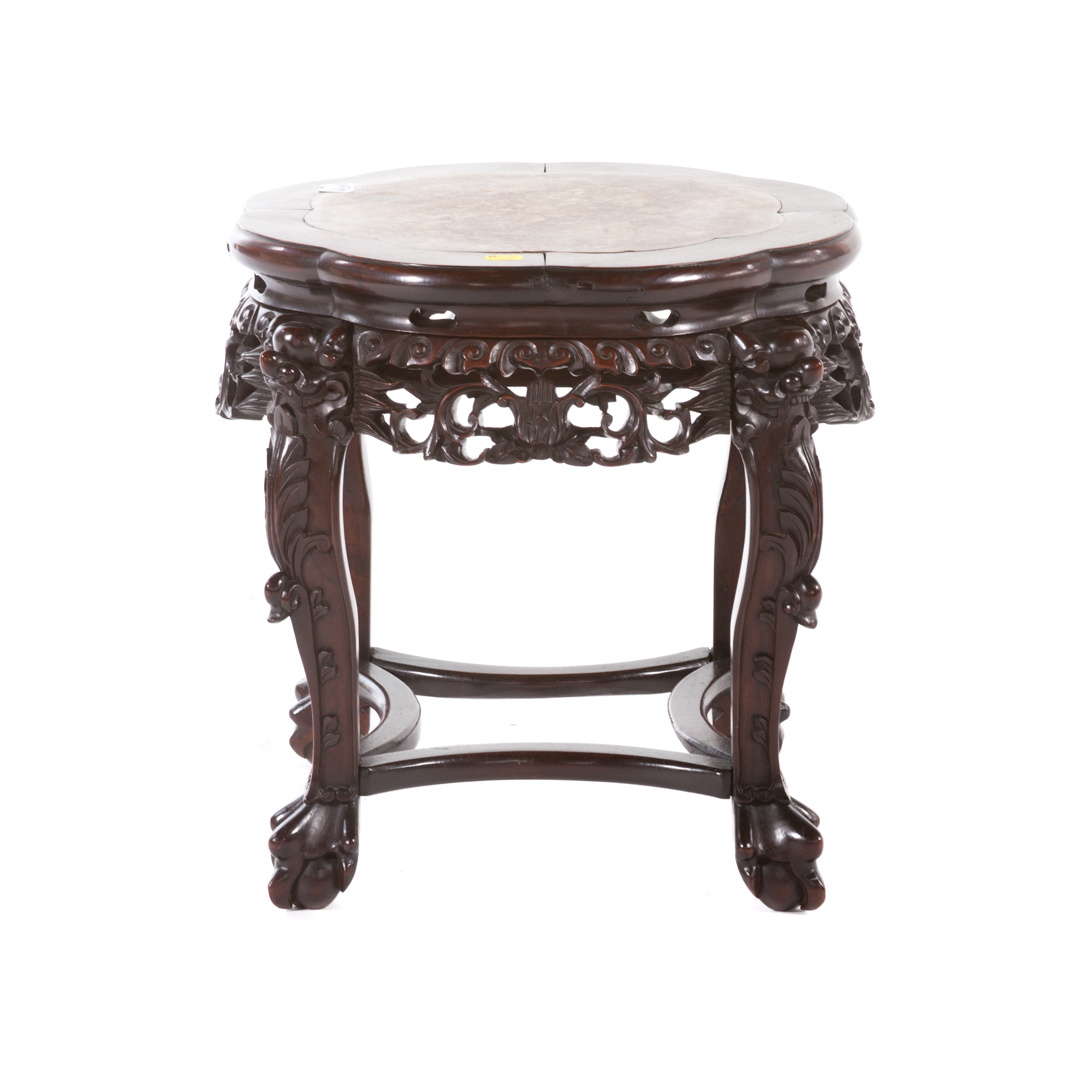 Appraisal: Chinese carved hardwood fern stand with inset marble top in