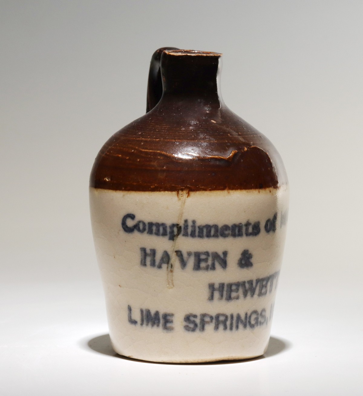 Appraisal: LIME SPRINGS IOWA STONEWARE MINI JUG