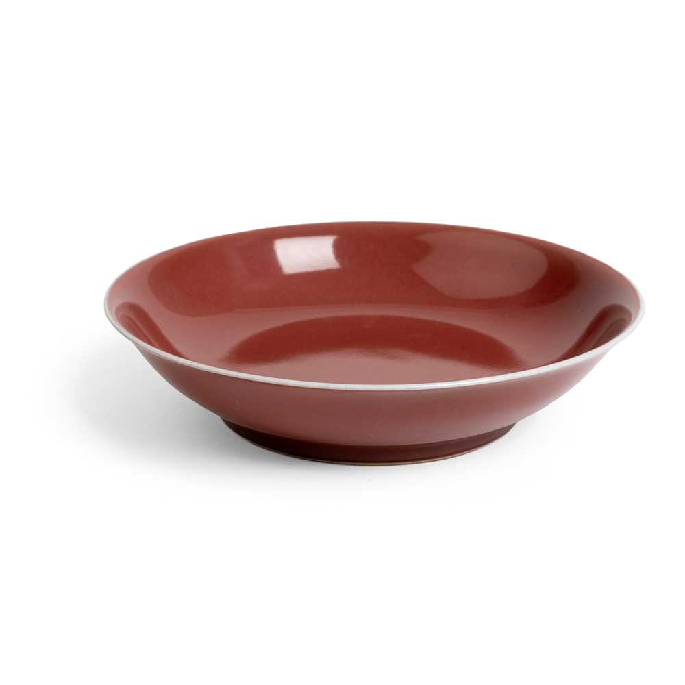 Appraisal: RED-GLAZED DISH DAOGUANG MARK rested on a short straight ring