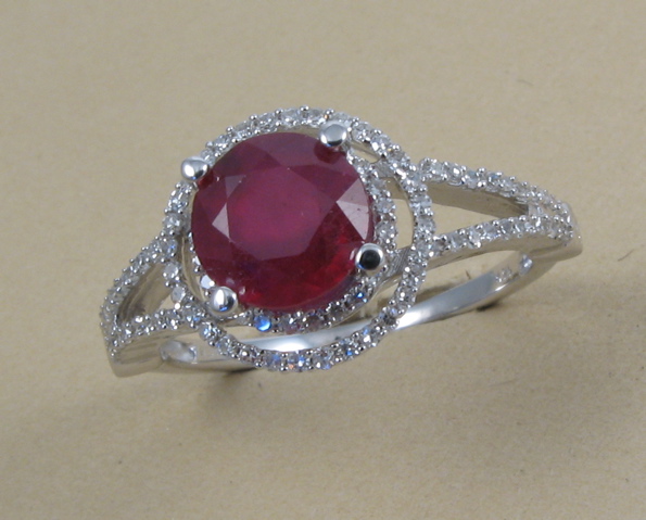 Appraisal: RUBY AND DIAMOND RING WITH APPRAISAL k white gold and