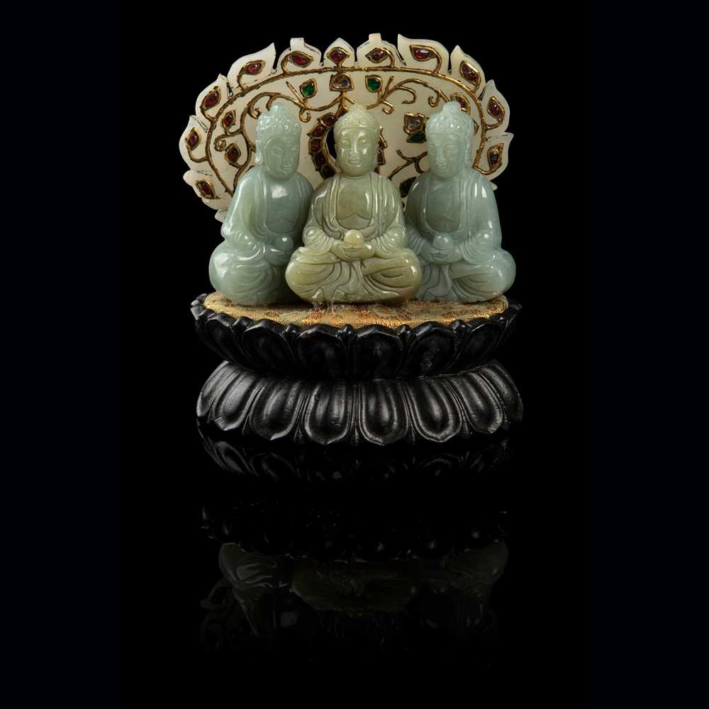 Appraisal: CELADON JADE BUDDHA TRIAD each Buddha carved seated in padmasana