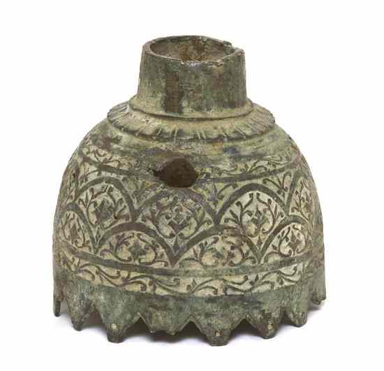 Appraisal: A Middle Eastern Bronze Candle Cup of baluster form with