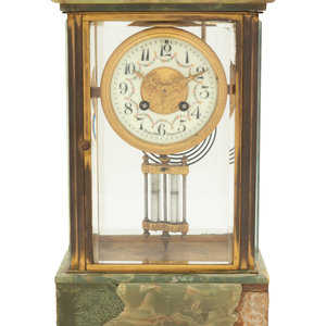 Appraisal: A French Parcel Gilt Bronze and Onyx Clock Retailed by