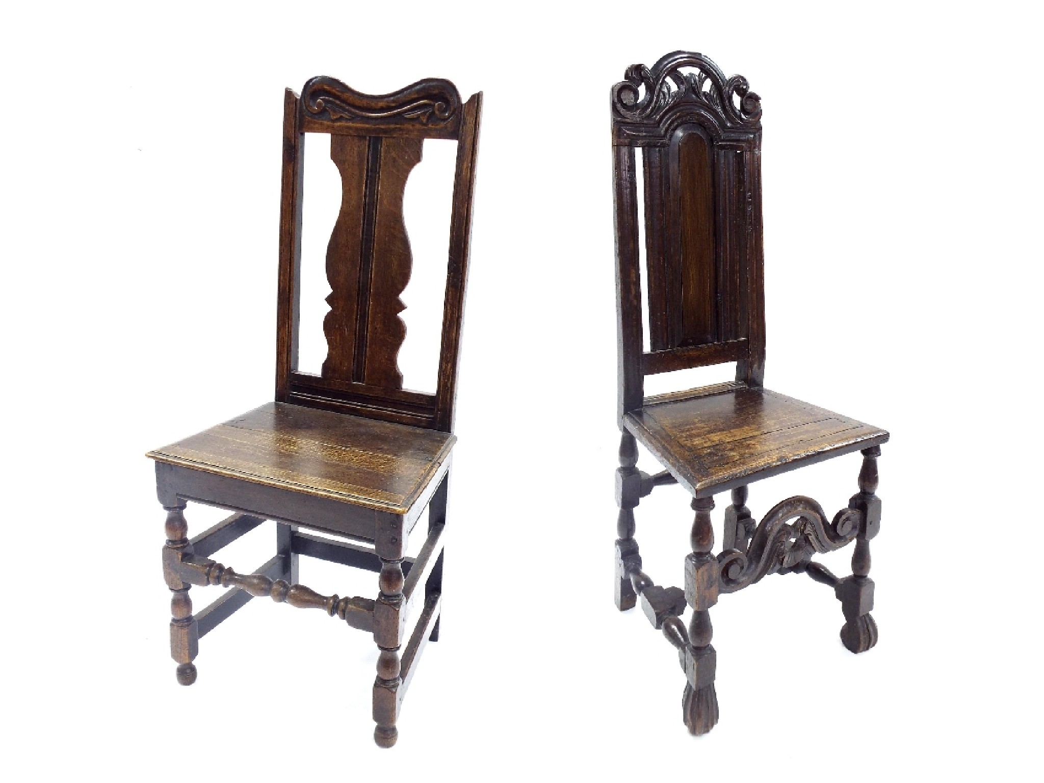 Appraisal: Two period oak hall chairs each with central vertical splat