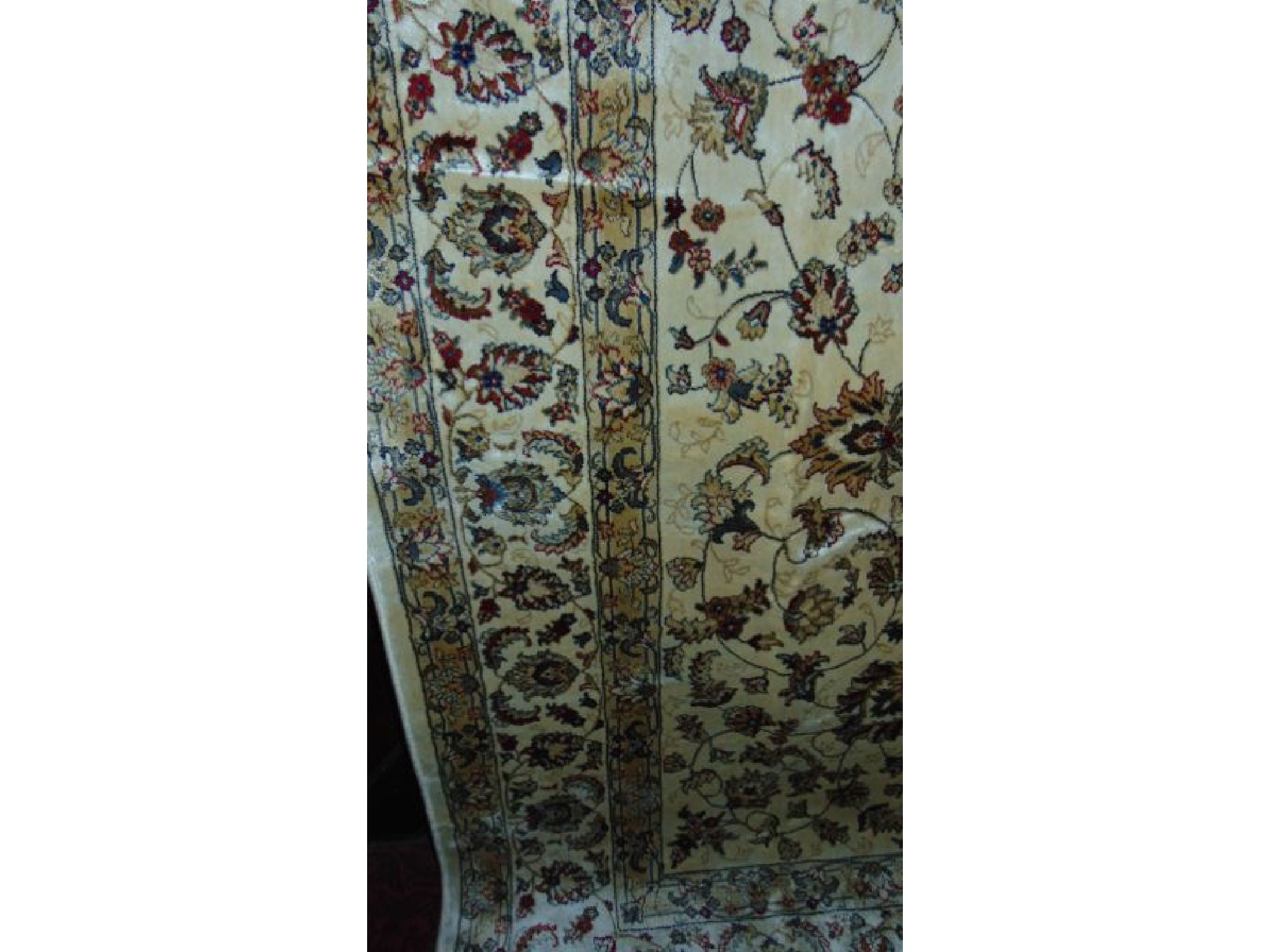 Appraisal: An Ivory ground Kashmir carpet with allover floral design x