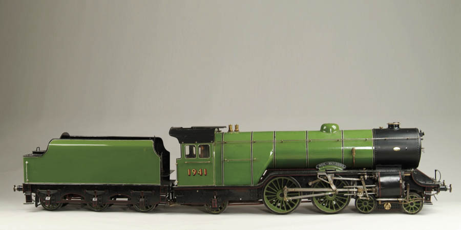 Appraisal: SPECTACULAR GAUGE ENAMELED LOCOMOTIVE TENDER This massive and impressive bright