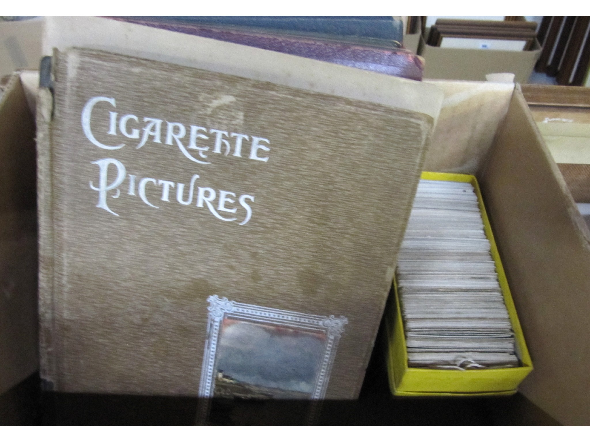 Appraisal: A box of albums of cigarette cards and a quantity