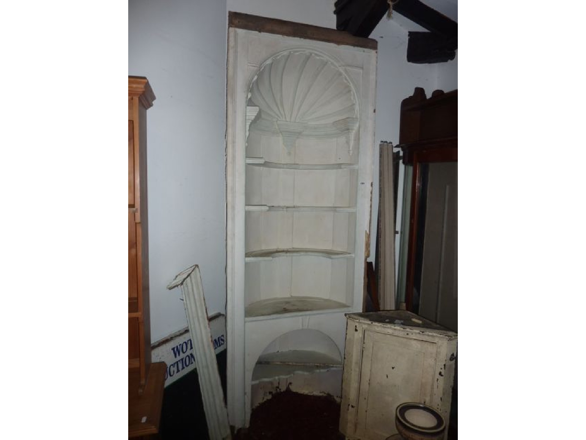 Appraisal: An th century pine barrel back alcove cupboard with shell