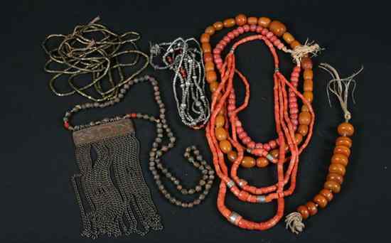 Appraisal: COLLECTION AFRICAN AND OTHER TRIBAL NECKLACES Including four-strand coral necklace