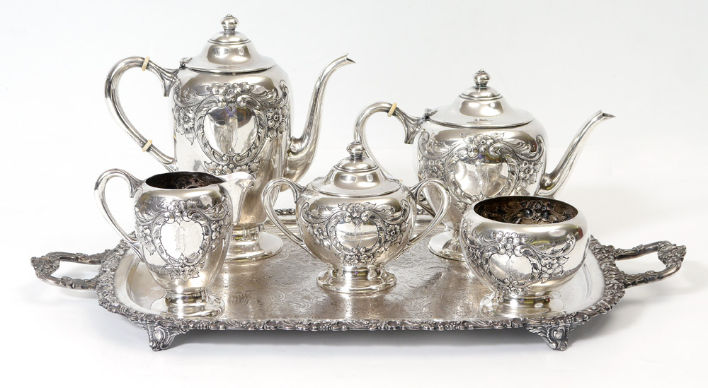 Appraisal: PIECE HAND CHASED STERLING TEA SERVICE Unidentified American maker pieces