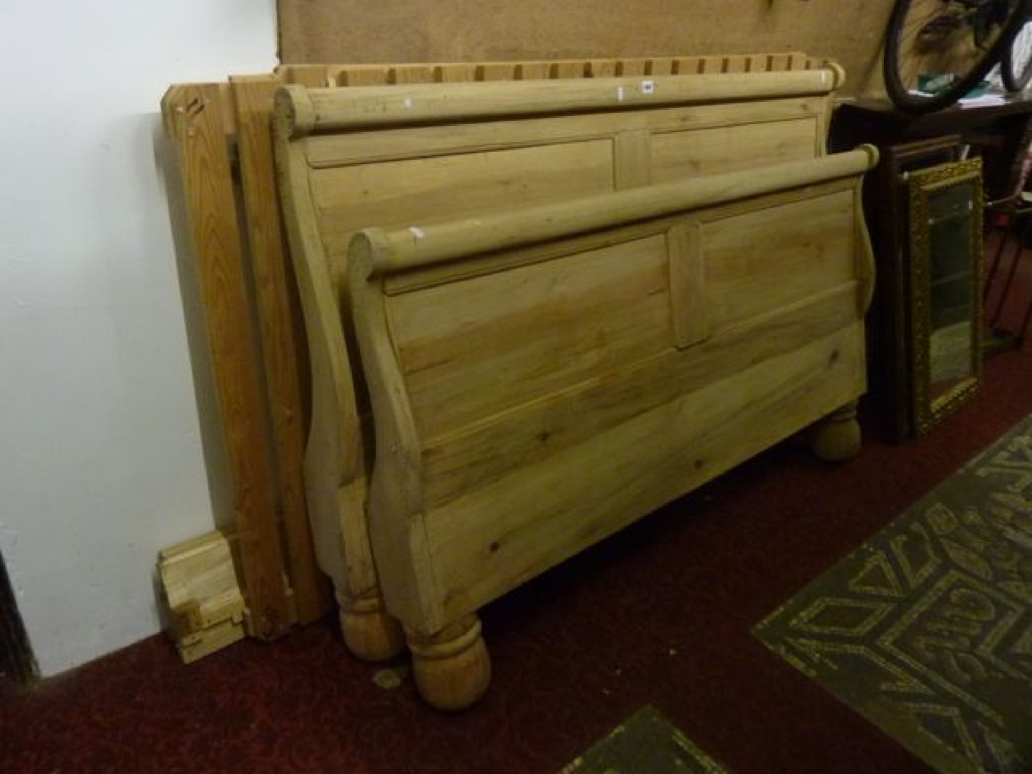 Appraisal: A stripped continental ft sleigh bed with shaped outline and