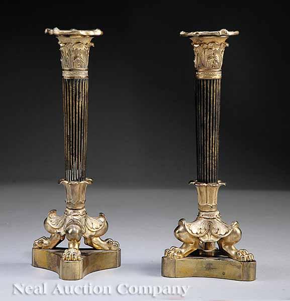 Appraisal: A Pair of Empire Gilt and Patinated Bronze Candlesticks th