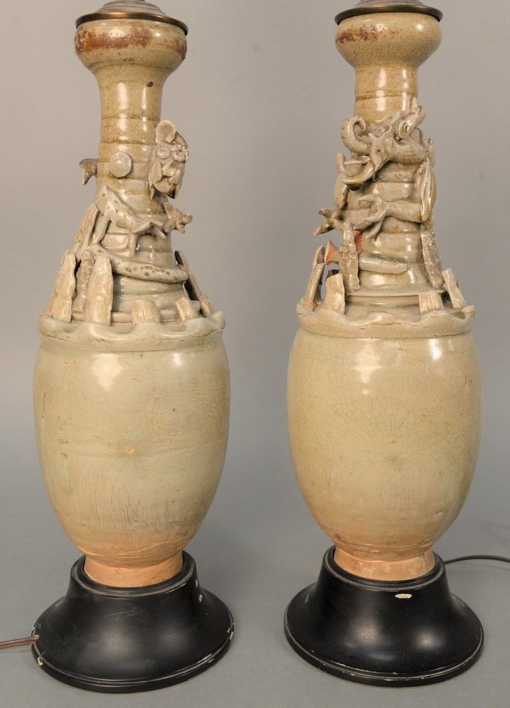 Appraisal: Pair of Chinese Funerary Vases with molded figures and dragons