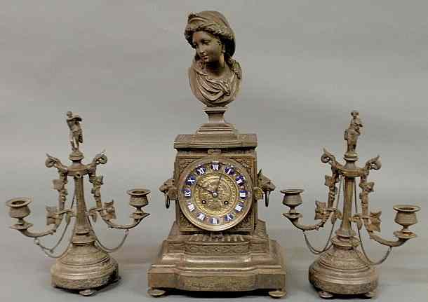 Appraisal: French spelter metal mantel clock late th c with white