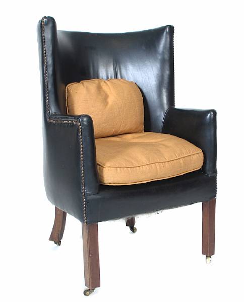 Appraisal: A George III style mahogany wing armchair height in width