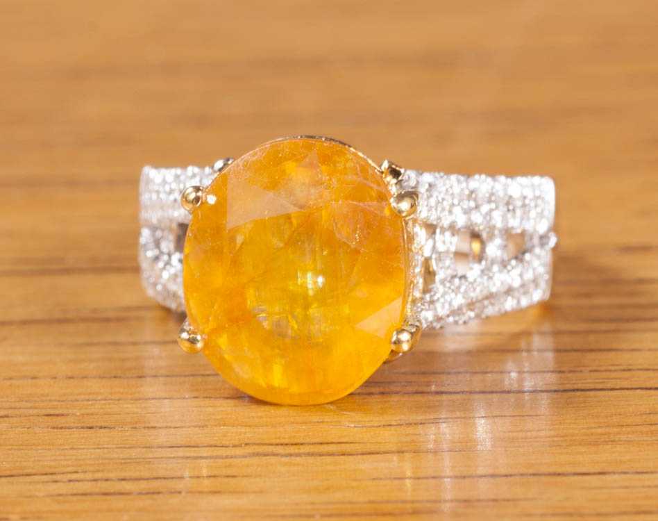 Appraisal: YELLOW SAPPHIRE AND FOURTEEN KARAT GOLD RING with AGI appraisal