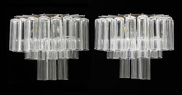 Appraisal: A set of four two-light three-tier wall sconces mid th