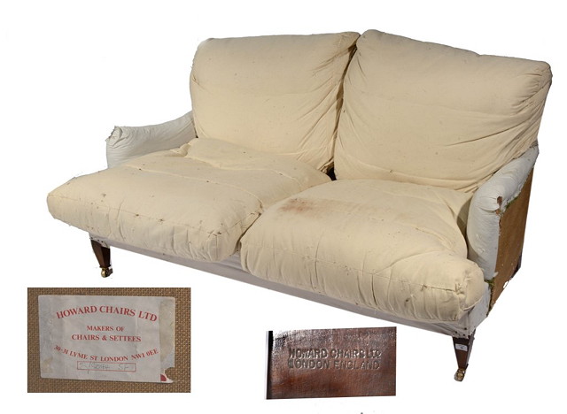 Appraisal: A LARGE HOWARD SOFA with calico cover and loose squab