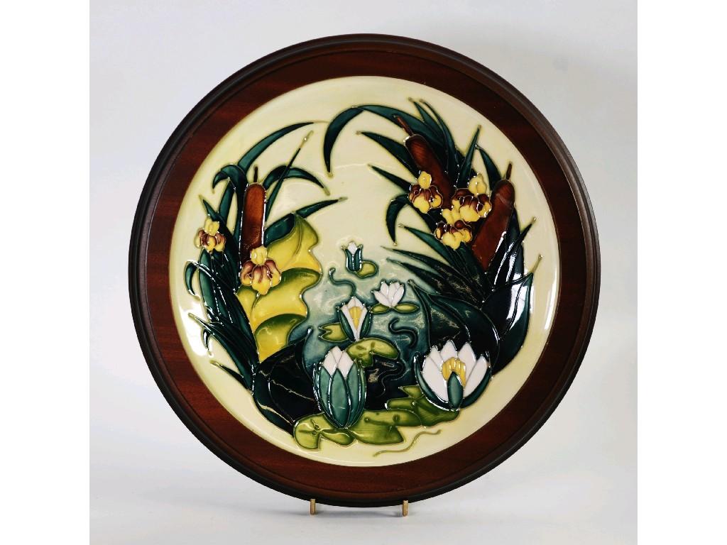 Appraisal: SECOND QUALITY MODERN MOORCROFT 'LAMIA' PATTERN TUBE LINED POTTERY PLAQUE